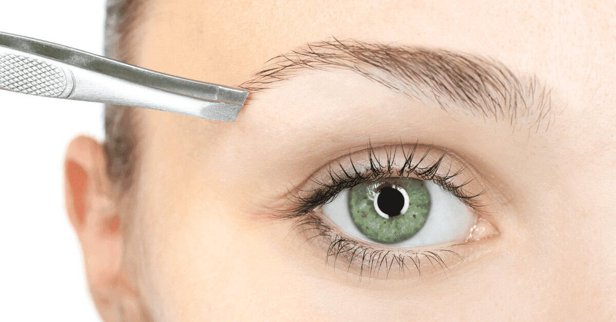 Remover eyebrow hair with precision tweezers to enhance eye beauty and define eyebrows. Perfect for detailed eyebrow grooming and maintaining a polished look.